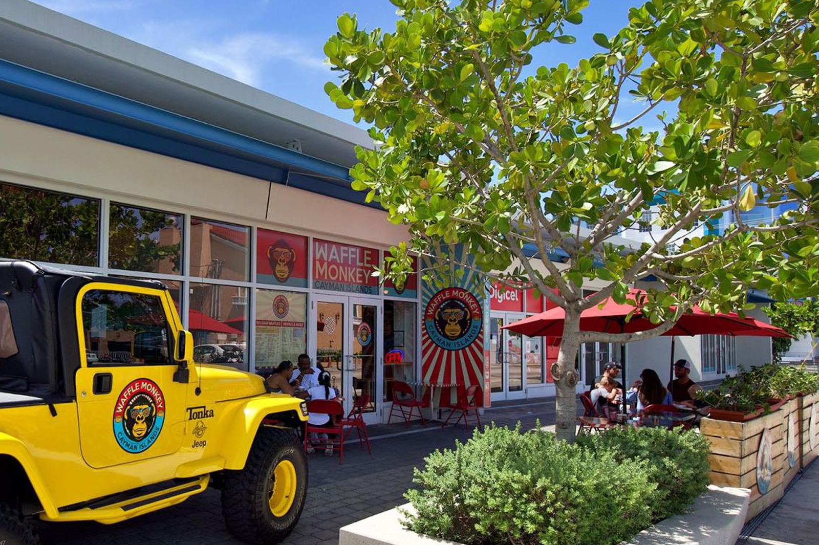 The Waffle Monkey Tonka Jeep outside the Cayman Cafe